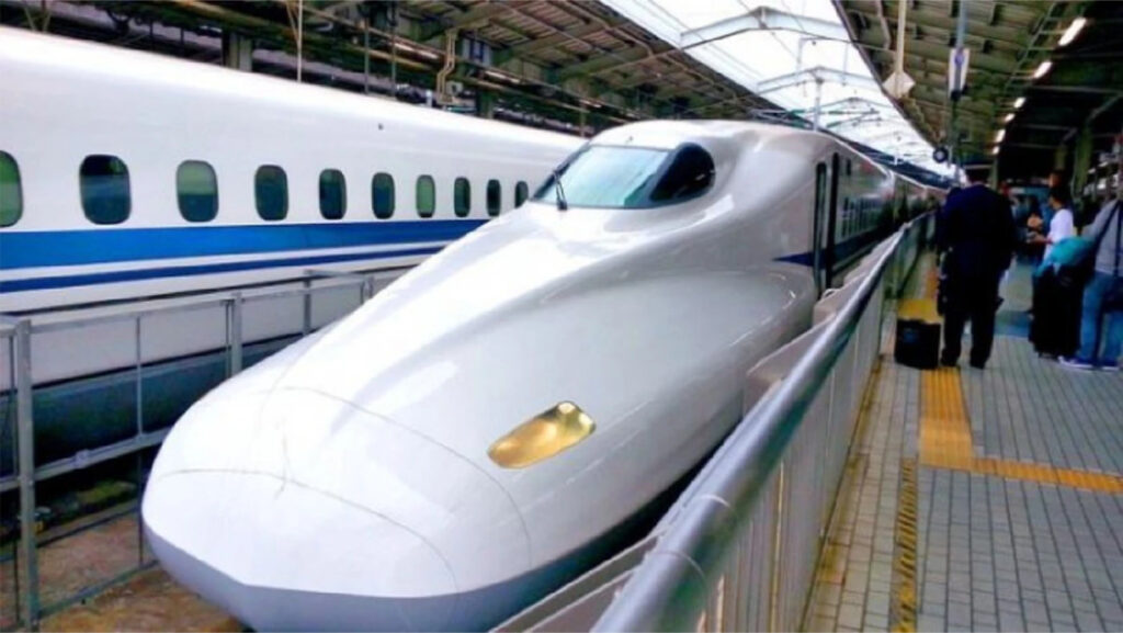 Shinkansen bullet train at a station platform in Japan